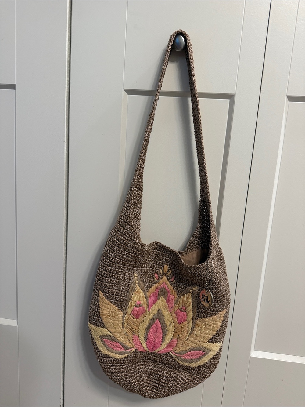 NWOT The Sak Hobo Handwoven Crochet Shoulder Bag with Pink Floral Embroidery
